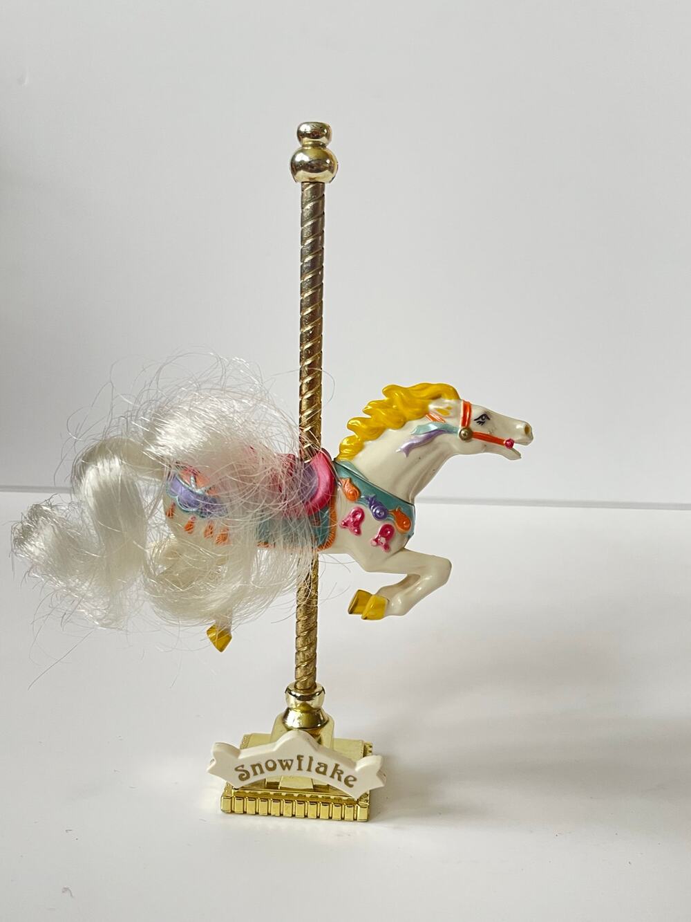 Vintage 1989 Matchbox Carousel Collection horse named "Snowflake".